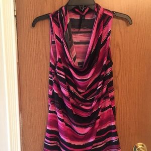 Pink, black and white sleeveless top.